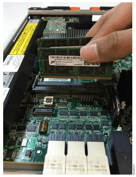 Image of DIMM being inserted in to the memory slot in the node canister